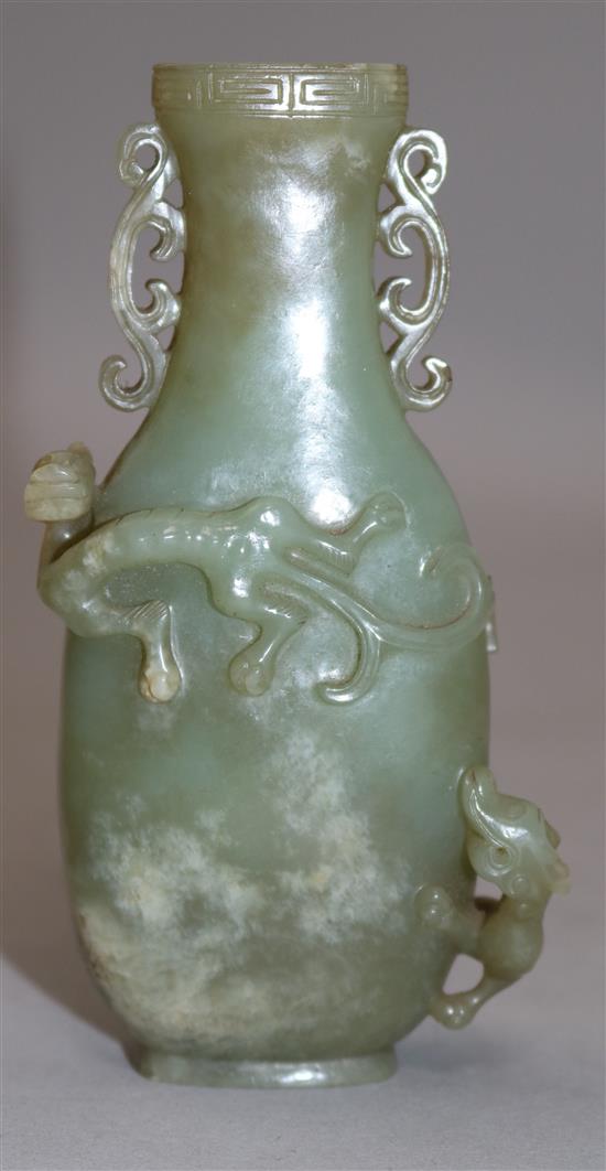 A Chinese archaistic celadon jade vase, Qianlong / Jiaqing period, 11.4cm